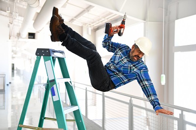 Man falling off ladder